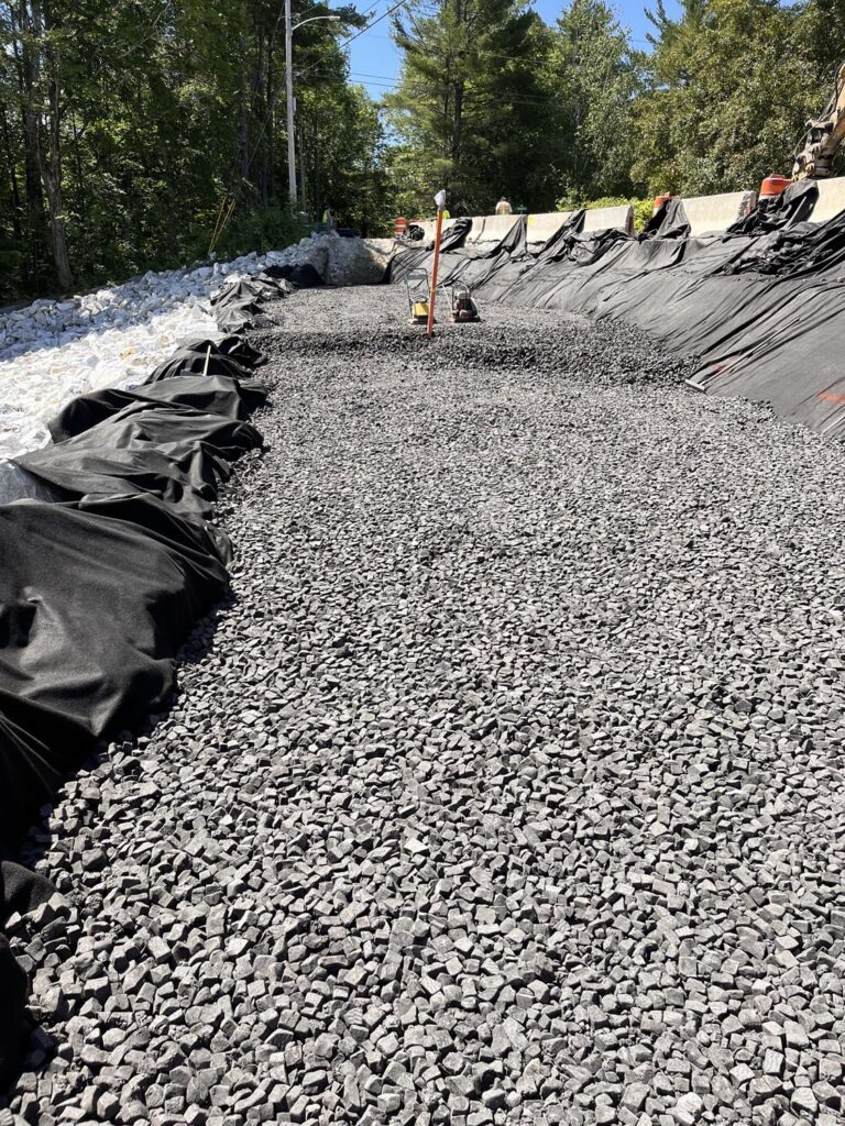 Foamed Glass Aggregate being used at the Dewey Avenue Road Stabilization